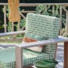 neutral geometric armchair with vases and plants