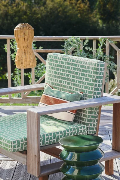 Rufolo Fabric - Celadon by neutral geometric armchair with vases and plants