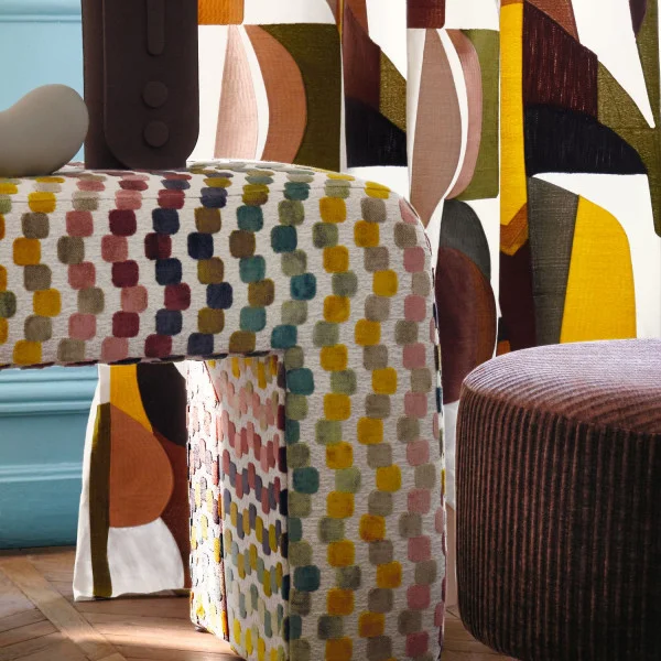 Orphisme Fabric - Bordeaux / Tangerine by yellow geometric sofa with pouf and curtain