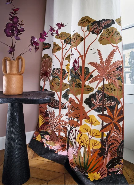 Ava Fabric - Terracotta by green animal curtain with side table and vases