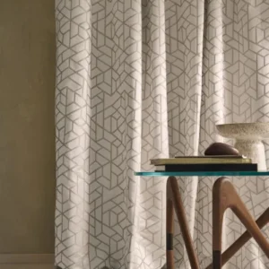 white geometric curtain with coffee table and vases