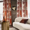 red botanical curtain with sofa and cushion