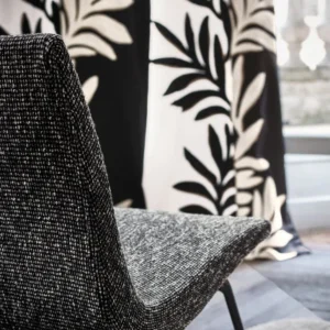 black-grey plain armchair with curtain