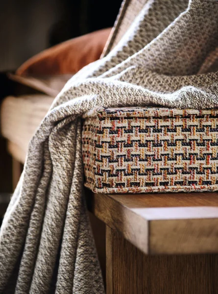 Magnifolia Fabric - Marron Glace by white striped curtain with cushion and wooden bench