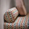 multicolour striped bed with cushion