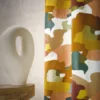 orange contemporary curtain with side table and vases