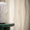 neutral misc curtain with side table and lamps