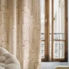 neutral geometric curtain with armchair and window