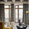 brown contemporary curtain with pouf and coffee table