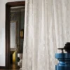 white geometric curtain with vases