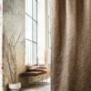 black-grey geometric curtain with vases and window