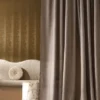 green plain curtain with armchair and coffee table
