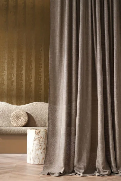 Conti Fabric - Champagne by green plain curtain with armchair and coffee table