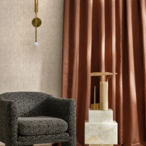 neutral geometric curtain with armchair and vases