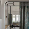 neutral geometric curtain with sofa and coffee table