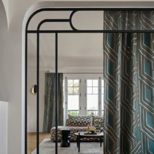 neutral geometric curtain with sofa and coffee table