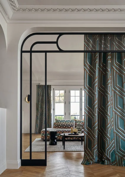 Porte Des Lilas Fabric - Grege by neutral geometric curtain with sofa and coffee table
