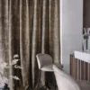 black-grey botanical curtain with armchair and vases