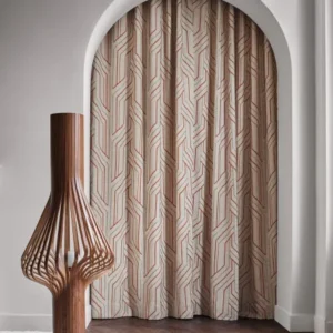 white geometric curtain with rug and vases