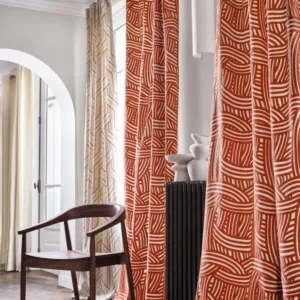 white misc curtain with chair and vases