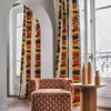 orange striped curtain with armchair and coffee table
