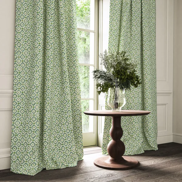 Ima Fabric - Marine by blue checked curtain with cushion and vases