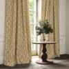 brown traditional curtain with cushion and vases