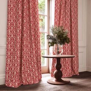 red traditional curtain with cushion and vases