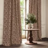 brown traditional curtain with cushion and vases