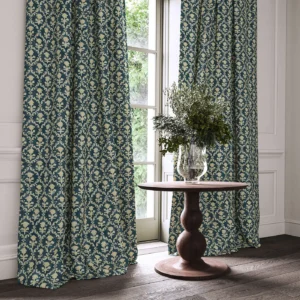 blue traditional curtain with cushion and vases