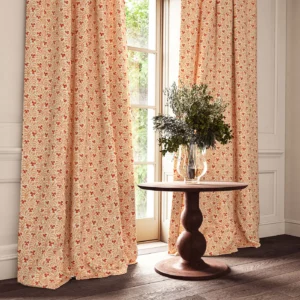 red botanical curtain with cushion and vases