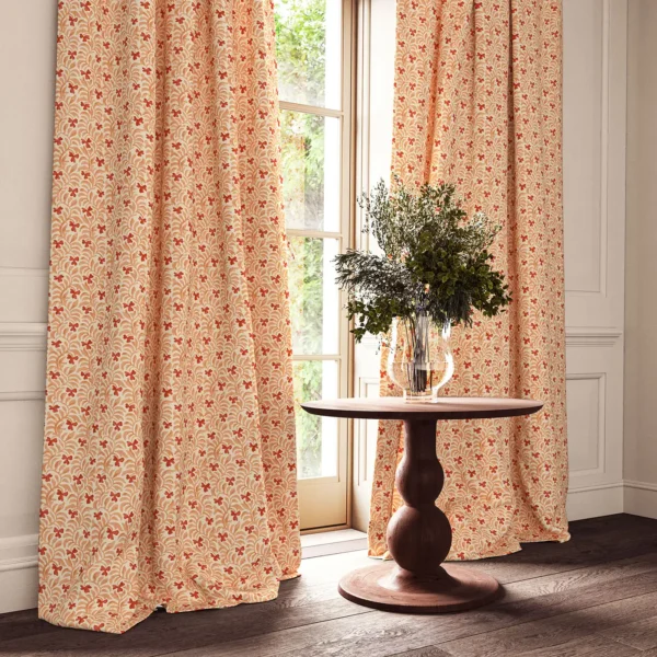 Yala Fabric - Coral by red botanical curtain with cushion and vases