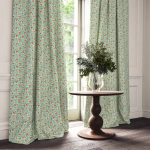blue botanical curtain with cushion and vases