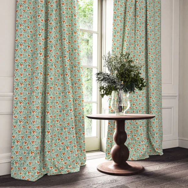 Yala Fabric - Geranium by blue botanical curtain with cushion and vases