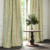 blue striped curtain with cabinets and vases