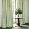 blue striped curtain with cabinets and vases