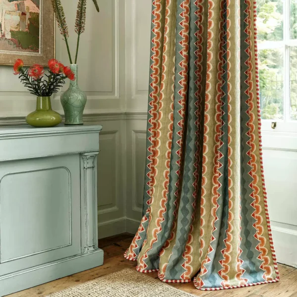 Taiki Fabric - River by blue striped curtain with cabinets and vases