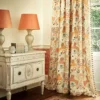 yellow animal curtain with cabinets and lamps