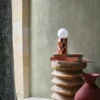green misc wallpaper and wall with side table and vases