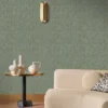 green plain wallpaper and wall with coffee table and bed