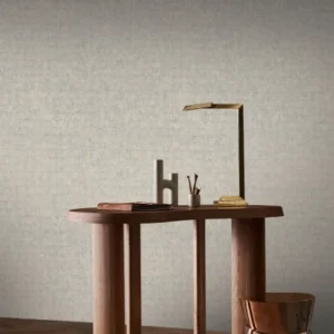 black-grey geometric wallpaper and wall with side table and lamps