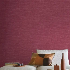 purple plain wallpaper and wall with pouf and cushion