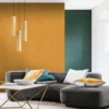 orange plain wallpaper and wall with sofa and coffee table