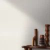 white plain wallpaper and wall with side table and vases