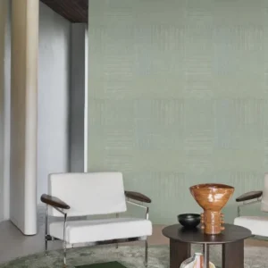 blue geometric wallpaper and wall with armchair and coffee table