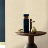 neutral misc wallpaper and wall with coffee table and vases