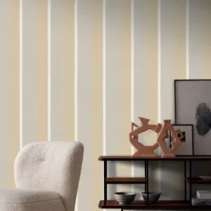 neutral striped wallpaper and wall with armchair and vases