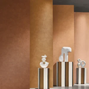 brown striped wallpaper and wall with pouf and vases