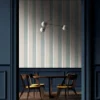 blue striped wallpaper and wall with dining table and chair