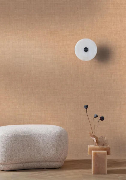 Sierra Wallpaper - Nude by orange plain wallpaper and wall with pouf and vases